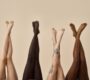 diverse female legs raised up on beige background 2025 02 11 16 18 13 utc min 90x80